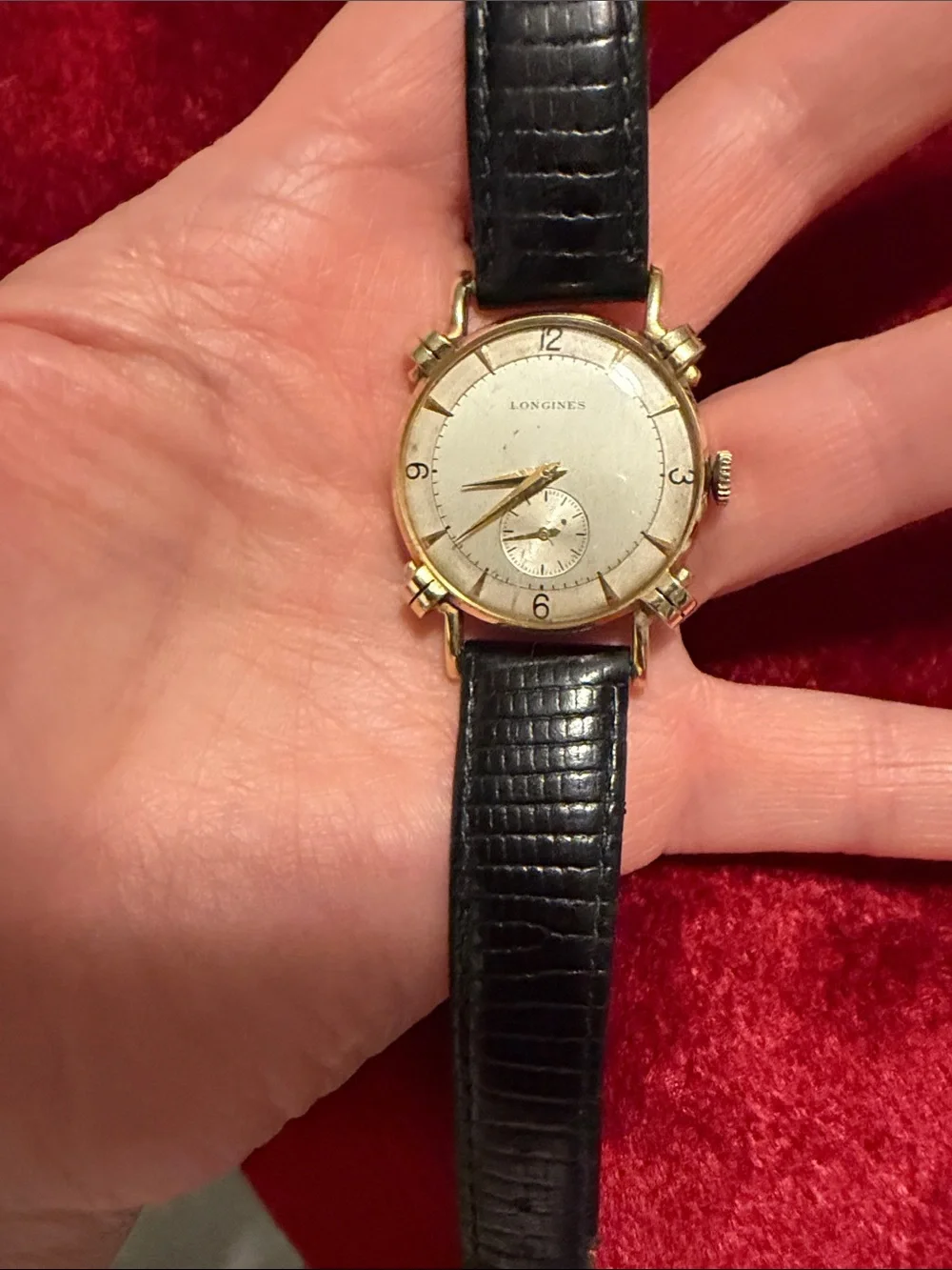 Vintage 14k gold case Longines watch; is running w genuine snake band; high end